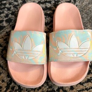 Girls  adidas slides size 5.